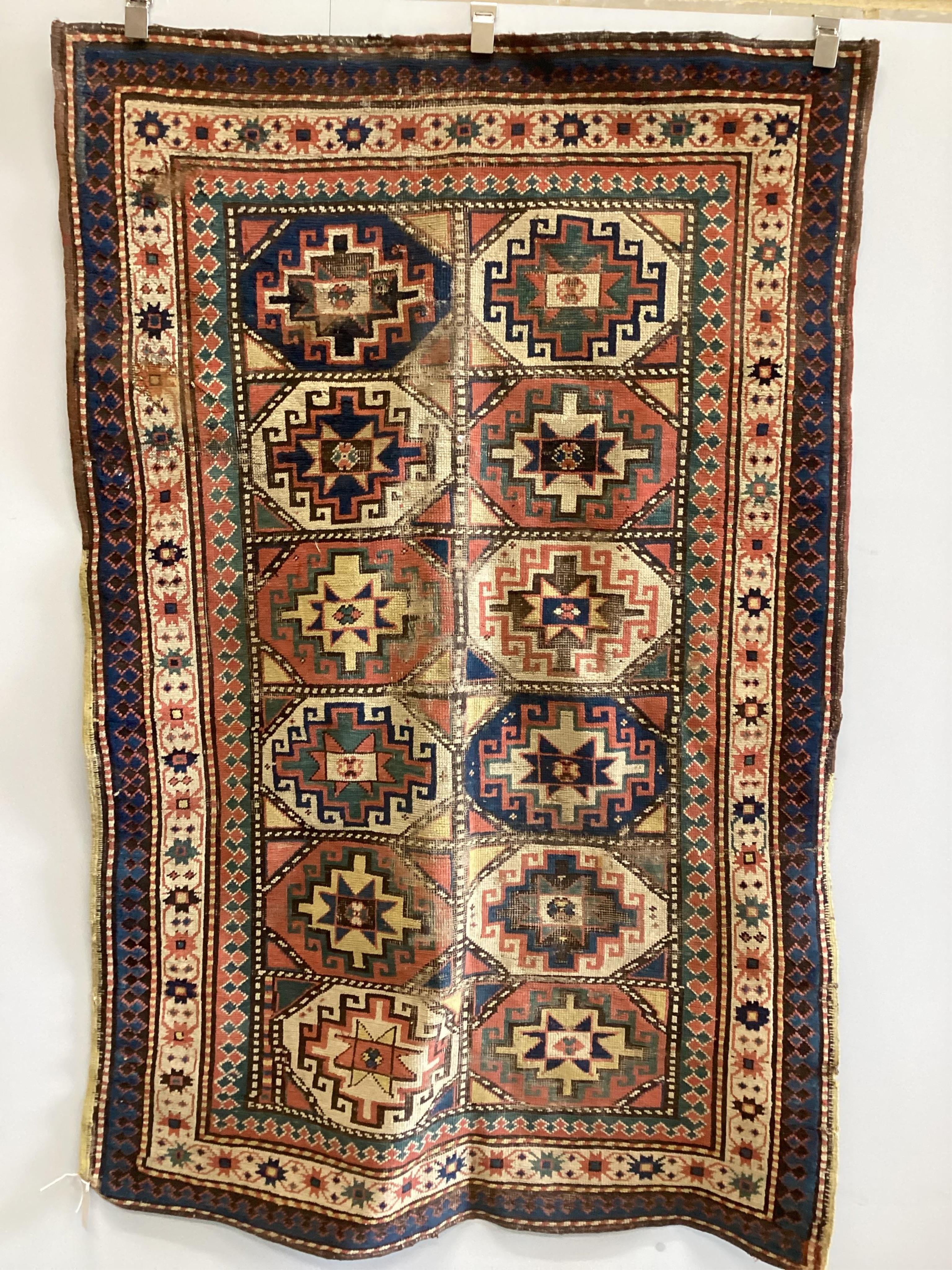 An antique Caucasian Shirvan rug, 184 x 117cm. Condition - poor-fair